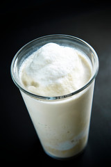 Vanilla shake in glass background 