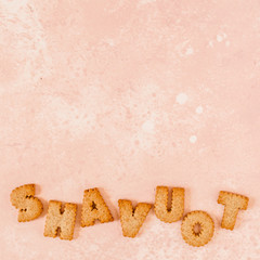 Crackers Arranged as a Word Shavout