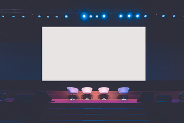 chairs on stage in conference hall  at business event or seminar meeting, business and education...