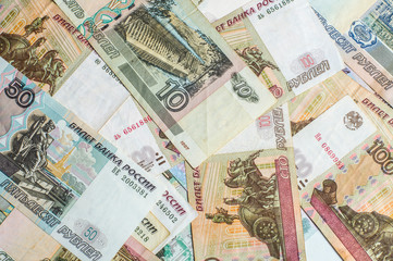 Fototapeta na wymiar Money. Russian rubles. Notes in denominations of five, ten, fifty, one hundred, five hundred and a thousand rubles. Cash. Background texture.
