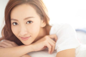 Obraz premium closeup young asian smiling woman face