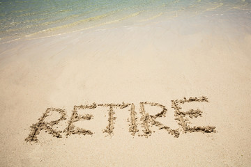 Retire Text On Sand Beach