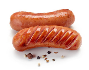 grilled sausages on white background