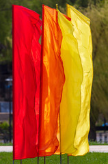 Yellow and orange flags in the park