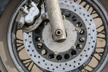 Metal parts on a motorcycle as a background
