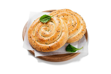 Baked spinach and ricotta pie isolated on white background.