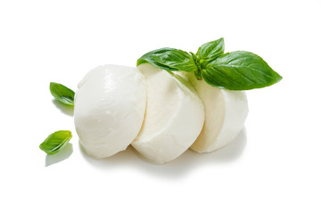 Traditional Italian Mozzarella cheese and basil on white background .