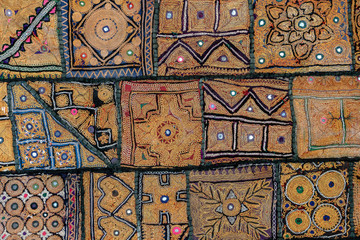Detail old patchwork carpet, India. Close up