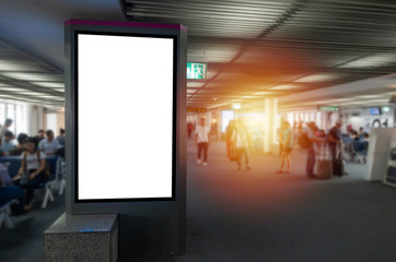 mock up of vertical blank advertising billboard or light box showcase in waiting zone at airport, copy space for your text message or media content, advertisement, commercial and marketing concept