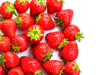 Ripe strawberries on white background