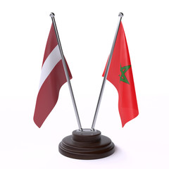 Latvia and Morocco, two table flags isolated on white background. 3d image