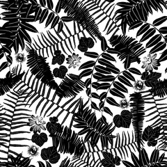 Vector black and white sillouette seamless pattern with ferns, leaves and wild flower. Suitable for textile, gift wrap and wallpaper.