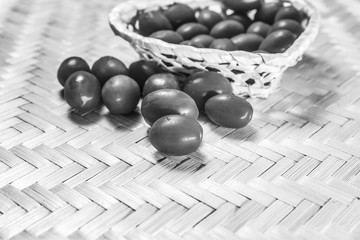 tomato placer vegetable on a wooden background basket tinted design base