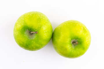 ripe juicy green apples focus top view on white background fruit set