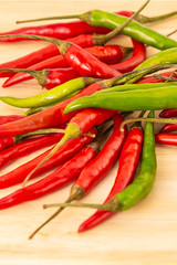 green red pepper spicy base of salsa sauce seasoned close-up vegetable background on a wooden backdrop