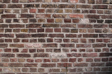 Rote alte Backstein Mauer