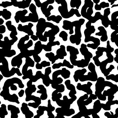 Abstract seamless pattern of black fashionable spots.