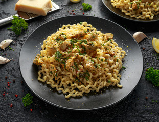 Artichoke hearts and lemon pasta with parmesan cheese and parsley