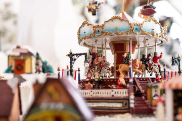 Miniature houses and figures to decorate Christmas.