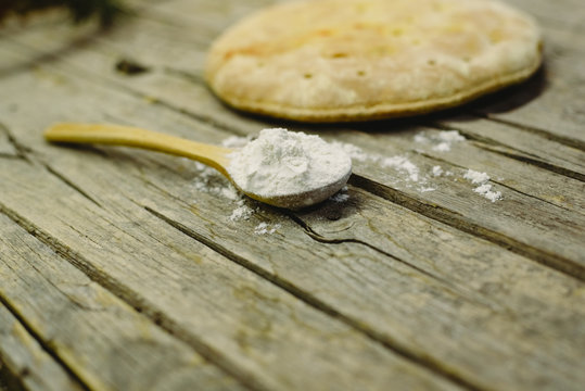 Pizza Calzone on old wooden table