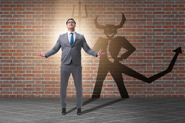 Devil hiding in the businessman - alter ego concept
