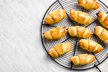 Golden brown and crispy french pastry croissants or rolls