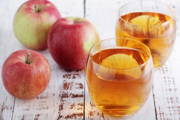 Two glasses with apple juice