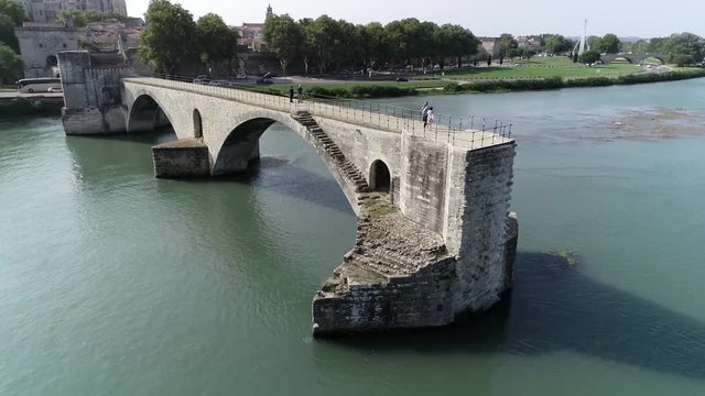 Aerial bird view of Saint B&eacute;n&eacute;zet also known as Pont d'Avignon is a famous medieval bridge over the Rhone in the town of Avignon in southern France and a popular tourist attration 4k high resolution