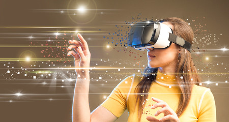 Digital screen with young woman with virtual reality glasses.
