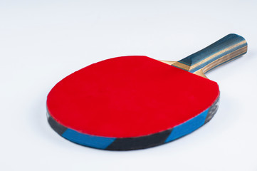 A red racket for table tennis isolated on a white background.Copy space