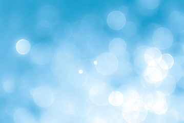 Obraz premium Abstract blue background with bokeh, bokeh background, sparkle bokeh background