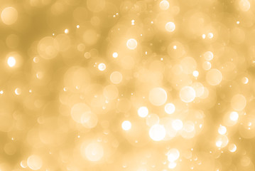 Obraz premium Abstract gold background with bokeh, bokeh background, sparkle bokeh background