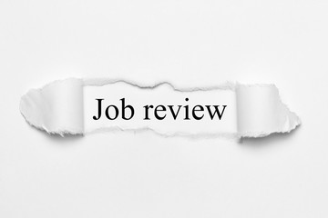 Job review on white torn paper