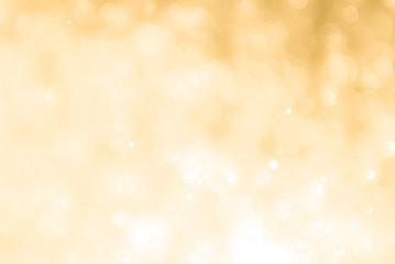 abstract golden background with light bokeh effect