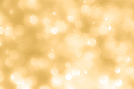 Gold background with light bokeh. Abstrat background