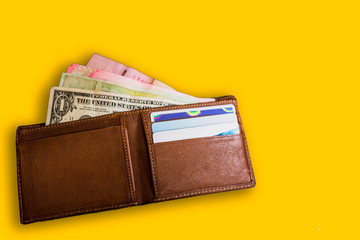 wallet with money isolated on white background