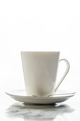 Front view of a delicious and tasty cup of freshly made coffee