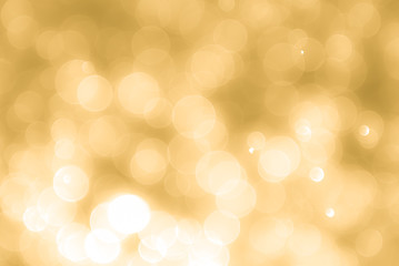 Obraz premium Streszczenie złote tło z bokeh, tło bokeh, blask tło bokeh