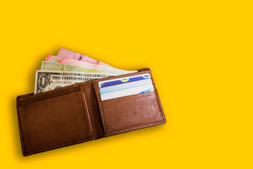 wallet with money isolated on white background