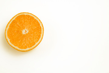 half an orange on white background, Isolated photo.