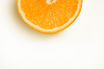 half an orange on white background, Isolated photo.