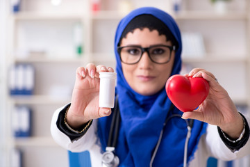 Female doctor in hijab working in the hospital