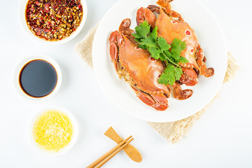 Chinese national cuisine, a dish of steamed crab and seasoning sauce