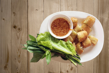crispy spring roll dim-sum Chiness on wood