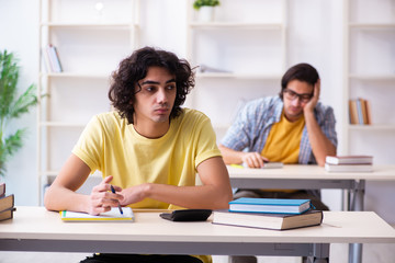 Fototapeta premium Two male students in the classroom