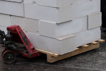 pallet with white gas blocks on the loader