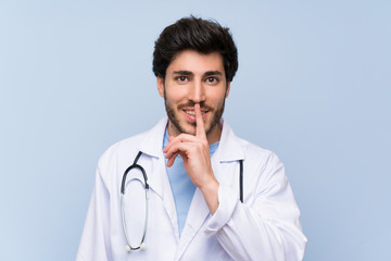 Doctor man doing silence gesture