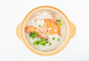 A pot of delicious crab seafood porridge on a white background
