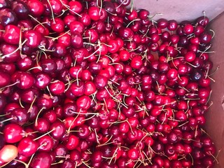 red cherry background of cherries