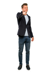 Blonde handsome man points finger at you with a confident expression